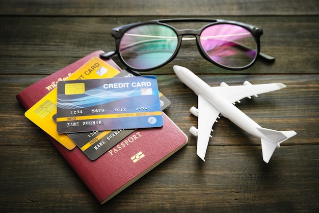 Photo passport and credit card on wooden desk