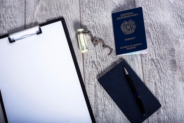 passport and handcuffs on the table