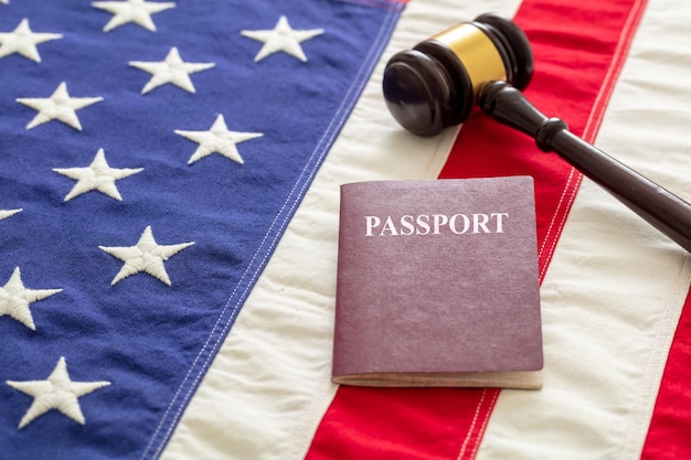 Photo passport and law gavel on usa flag background close up view