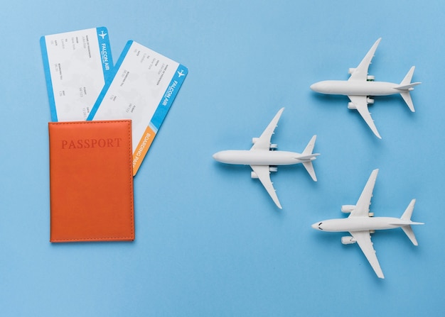 Passport, tickets and small airplanes