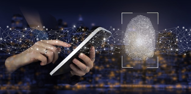 Password control through fingerprints. Hand touch white tablet with digital hologram fingerprint sign on city dark blurred background. Biometric and security concept.