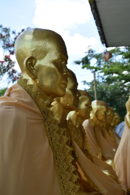 Photo past many famous amulets statue of thailand  suphanburi province thailand