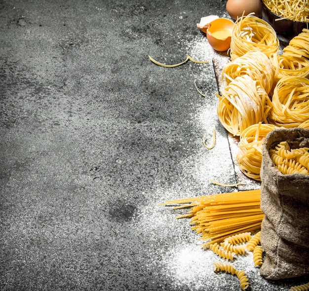 Pasta background. Cooking different types of pasta.