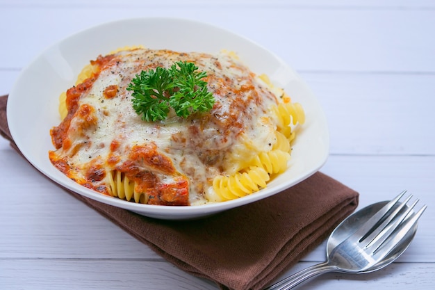 Pasta baked with tomato sauce and cheese