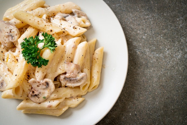 Pasta carbonara cream sauce with mushroom