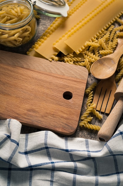 Pasta collection on rustic wooden background