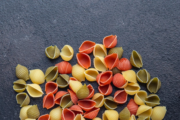 pasta conchiglie colorful mix green yellow red broccoli carrot beet color healthy meal food