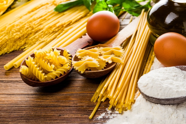 Pasta cooking in the kitchen with chicken eggs and flour