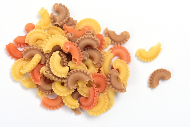 Pasta creste di gallo on white background