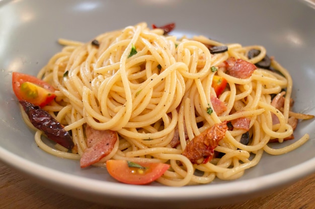 Pasta dish on wooden table stock photo