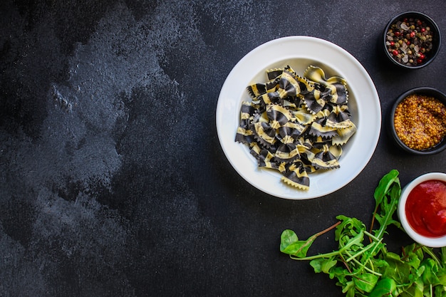 pasta farfalle cuttlefish ink (healthy eating, black multi-colored)