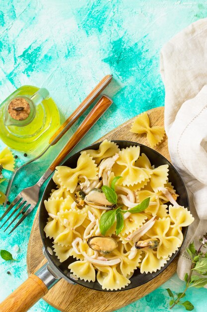 Pasta Farfalle with seafood on stone table Vegetarian  seafood pasta