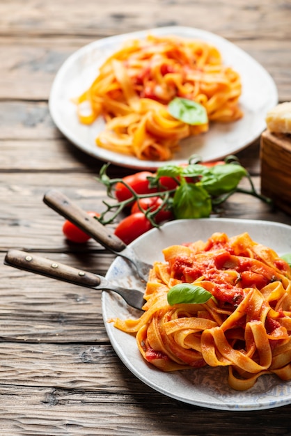 Pasta fettuccine with tomato and basil