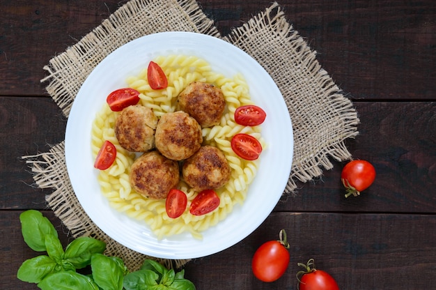 Pasta futsilli with meat balls, cherry tomatoes