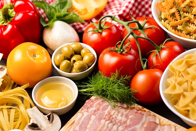 Pasta Ingredients with vegetables, mushrooms, olives. Mediterranean cuisine concept