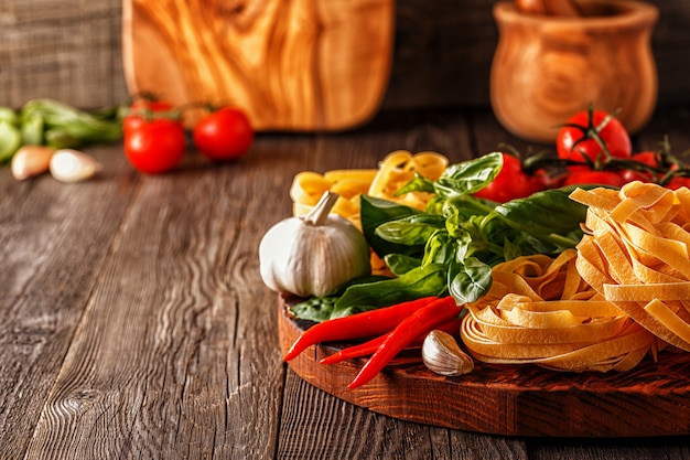 Pasta ingredients on a wooden table