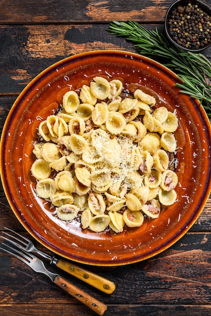 Pasta Orecchiette with pancetta, egg, hard parmesan cheese and cream sauce.