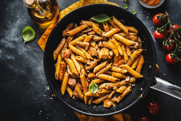 Pasta penne with mushrooms and sauce