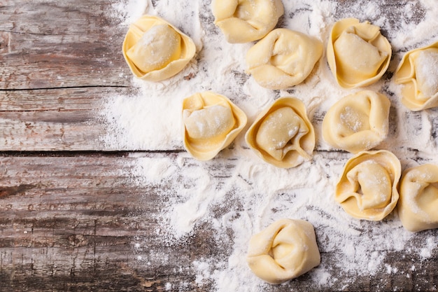 Pasta ravioli on flour