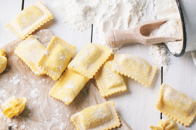 Pasta ravioli on flour