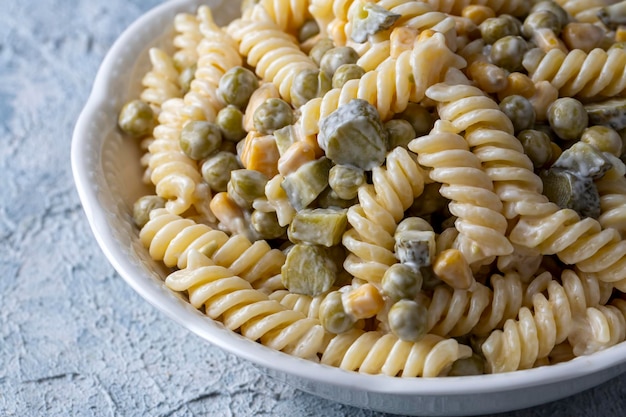 Pasta salad with mayonnaise and vegetables