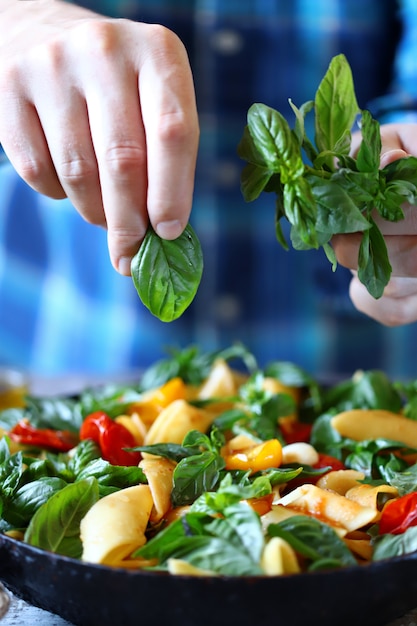 Pasta salad with tomatoes and basil