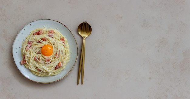 Pasta spaghetti carbonara with egg.