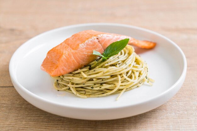 pasta spaghetti with pesto green and salmon