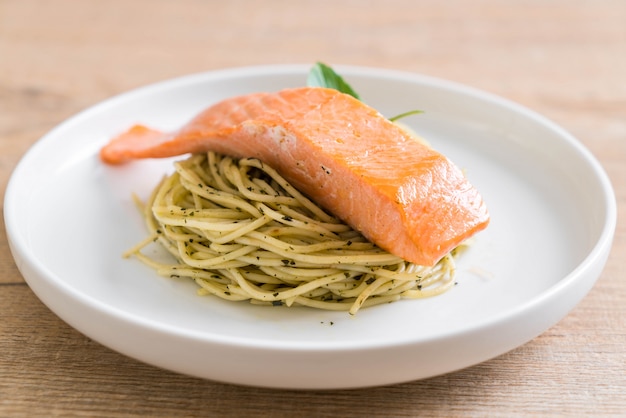 pasta spaghetti with pesto green and salmon