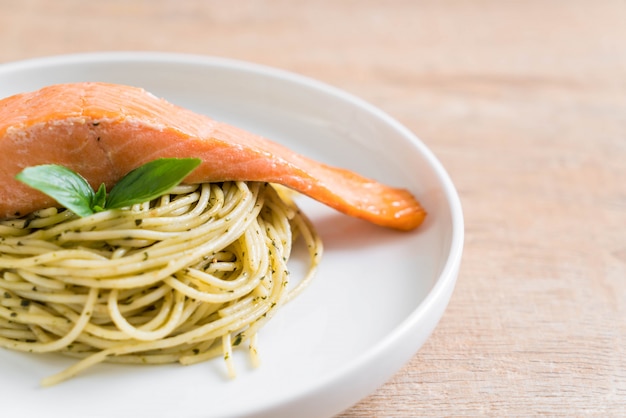 pasta spaghetti with pesto green and salmon