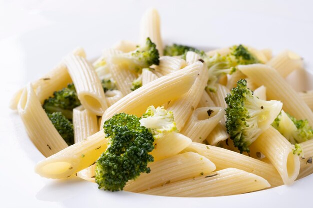 Pasta with broccoli on a white plate