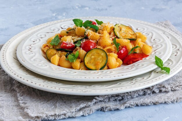 Pasta with cherry tomatoes and zucchini