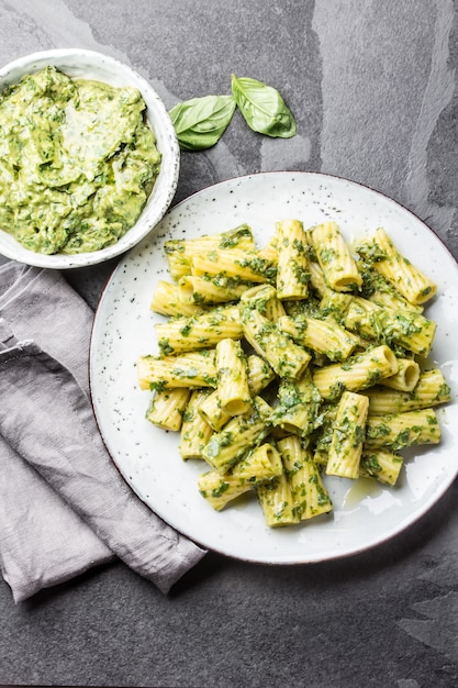 Pasta with green avocado herbs sauce