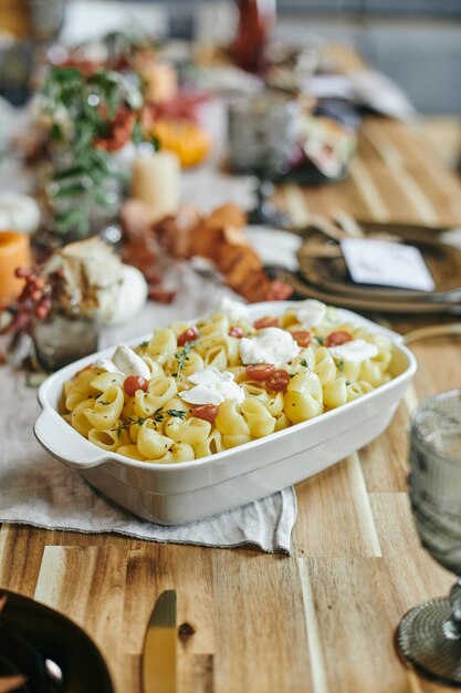 Pasta with meat on dining table