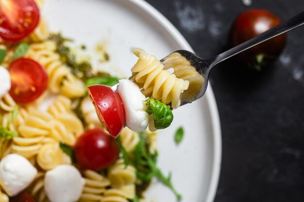 Pasta with mozzarella and tomatoes Pasta caprese