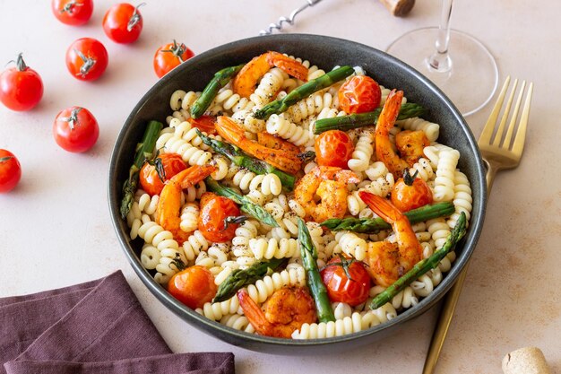 Pasta with shrimp asparagus and tomatoes Healthy eating Diet