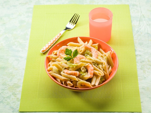 Pasta with shrimp and savoy cabbage