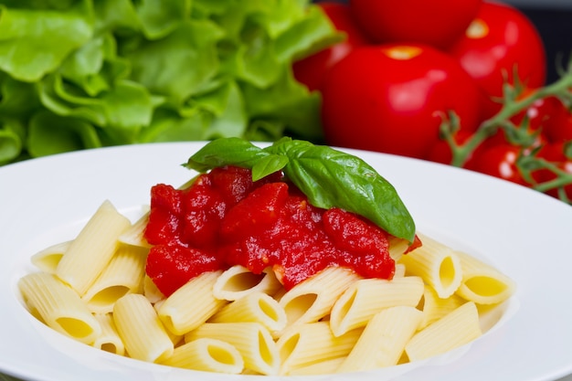 Pasta with tomato sauce and basil