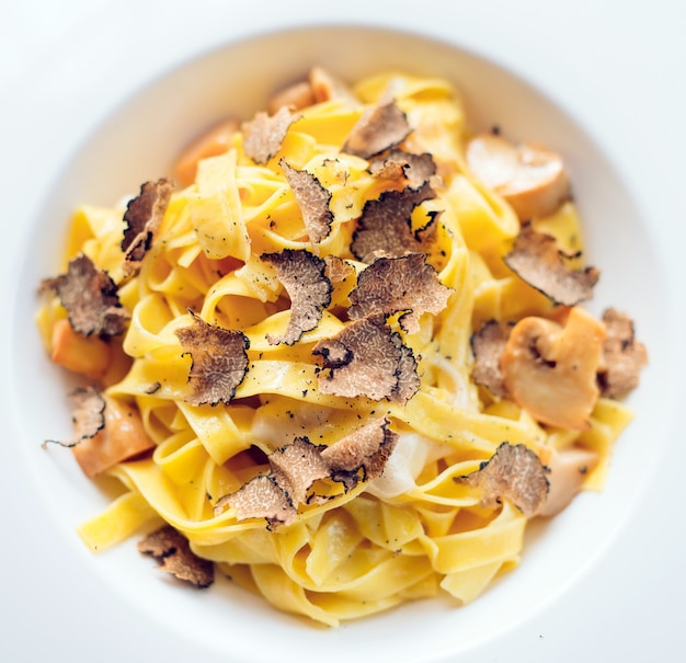 Pasta with truffles, typical autumn dish.restaurant menu dish