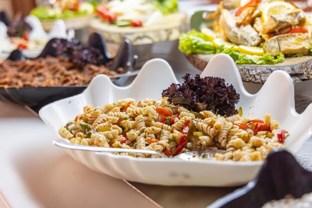 Pasta with vegetables at a hotel buffet