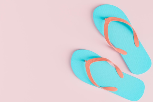 Pastel colored flip flops with copy space