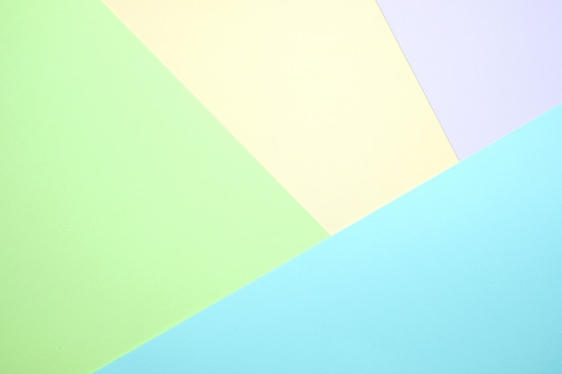 Pastel colour paper flat lay 