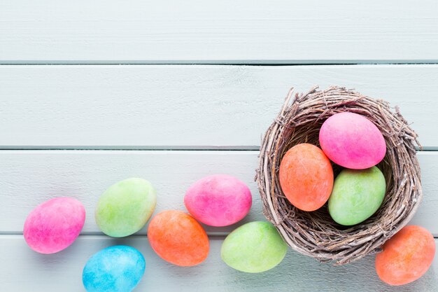 Pastel Easter eggs on wooden