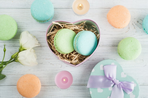 Pastel green gift box and macaroons