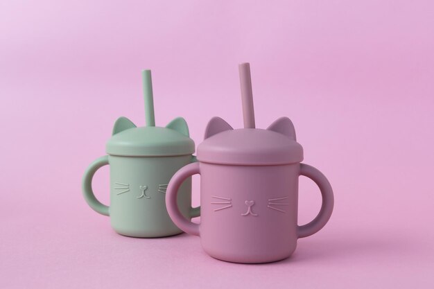 Pastel green and pink sippy cup with straw silicone first soft cup for toddler baby tableware