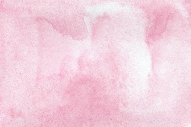 Photo pastel pink abstract watercolor background on textured paper