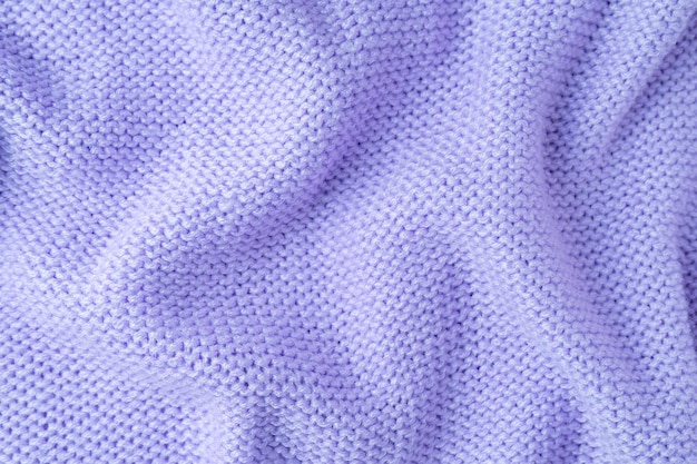 Pastel purple knitwear wool fabric texture background Abstract textile backdrop