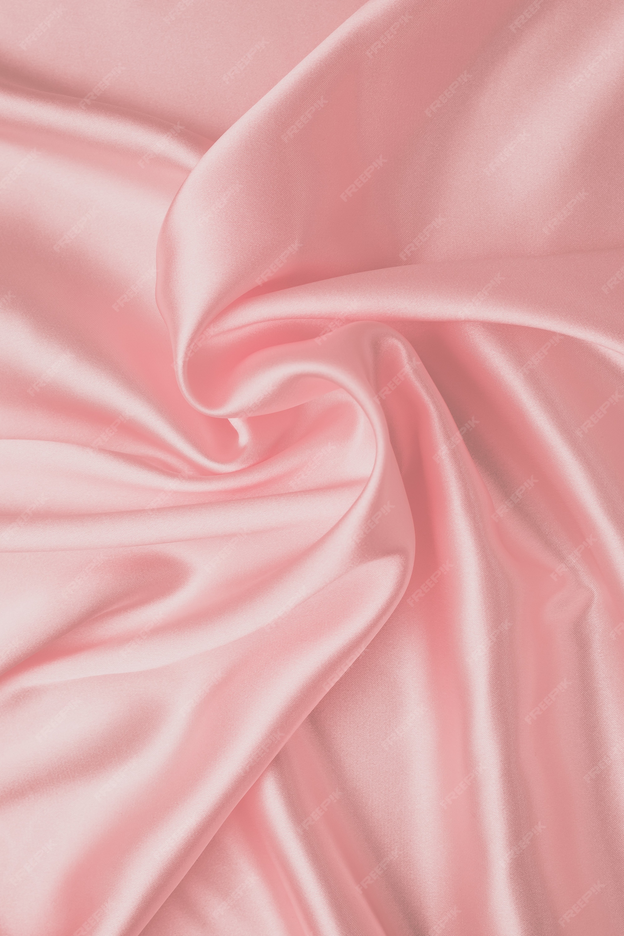 Premium Photo | Pastel soft pink background, silk fabric pattern. abstract  light wallpaper with waves of luxury textile. smooth glossy cloth, satin  texture with folds.