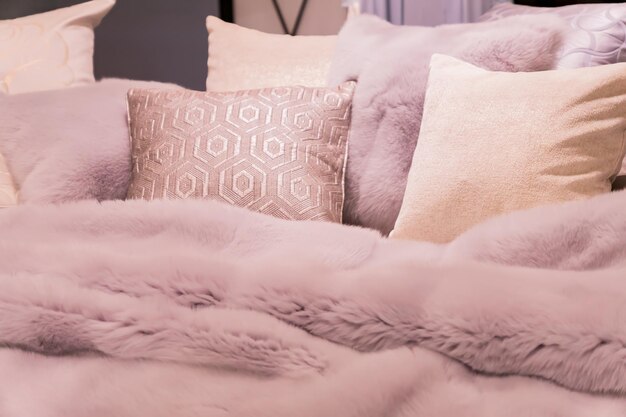 pastep purple bedding - soft pillows and fur coverlet coziness comfort interior  concept