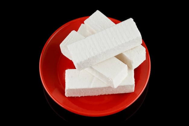 Pastilla white confectionery product on black